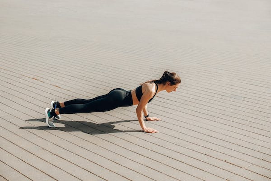 lady performing plank exercise